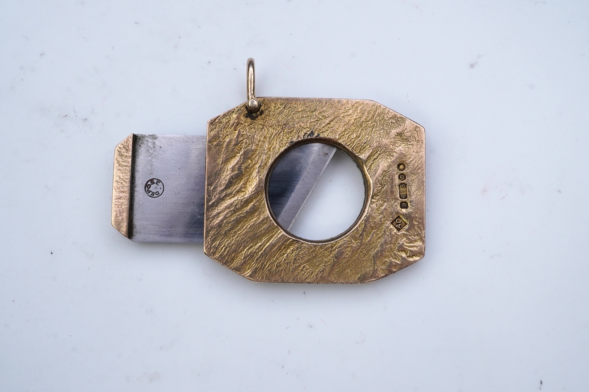 Dunhill, a 9ct gold and steel cigar cutter, circa 1968